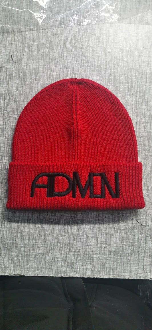 Admin Aesthetic red cuffed beanie with black logo.