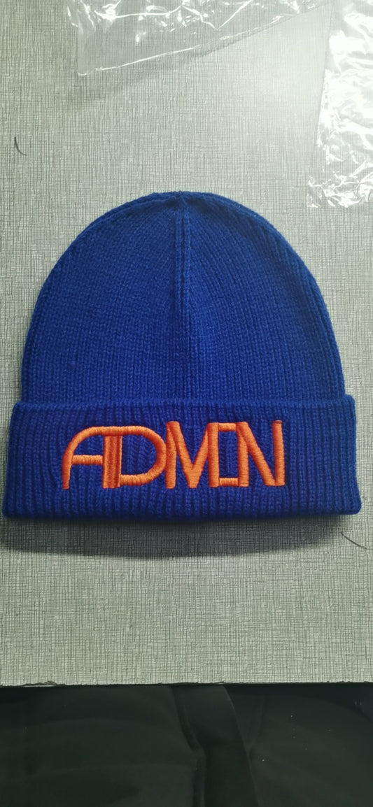 Admin Aesthetic royal blue beanie with orange logo.